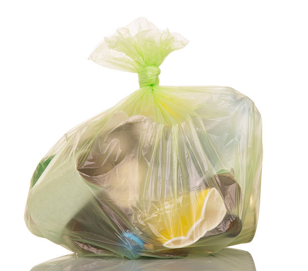 istock Garbage bags with household waste isolated on white 531476396