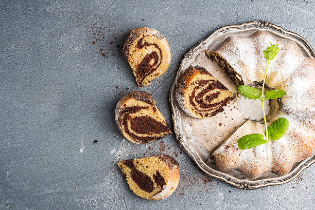 istock Zebra bundt cake cut into pieces and mint leaves 531478712