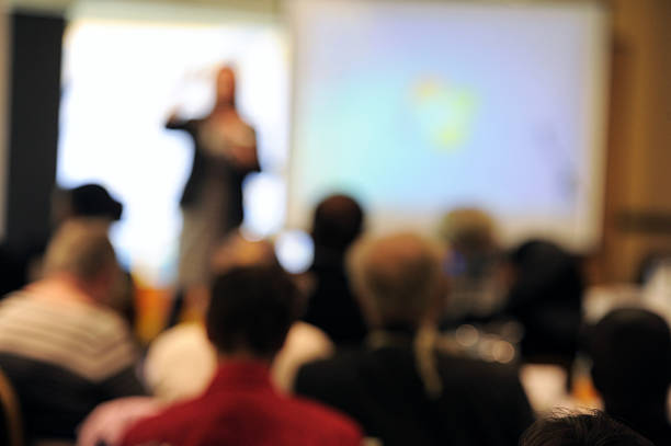 istock Conference Presenter & Audience - Stock Photo 531478851