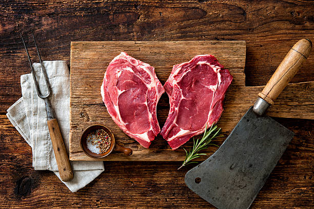 istock Heart shape raw fresh veal meat steaks 531478902