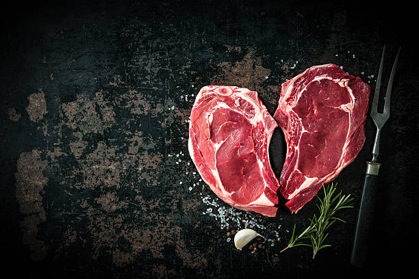 istock Heart shape raw fresh veal meat steaks 531479052