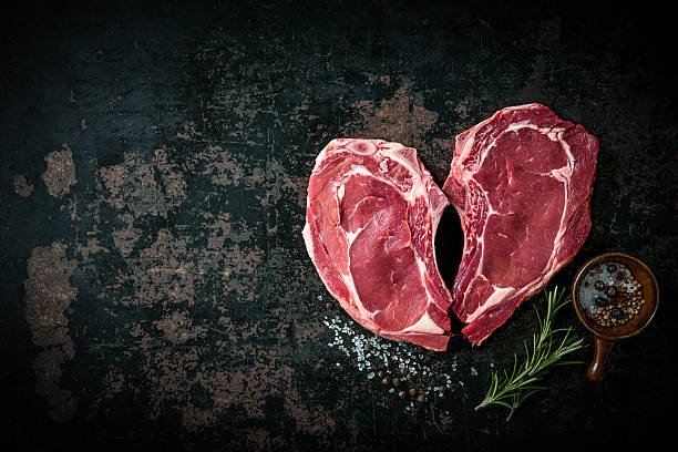 istock Heart shape raw fresh veal meat steaks 531479188