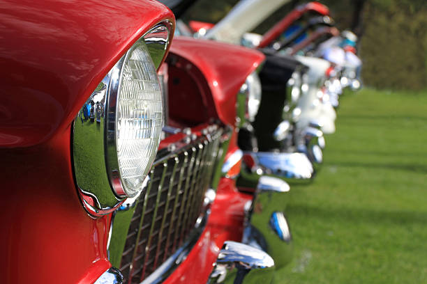 Classic Cars Row of classic 1955 - 1957 Chevys at a car show. car show stock pictures, royalty-free photos & images
