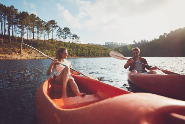 istock Young couple kayaking on a lake 531479916