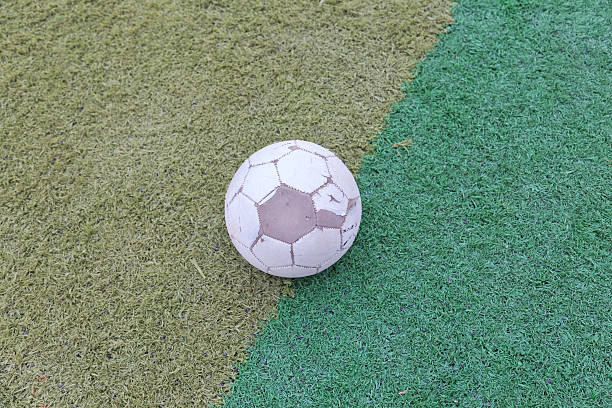 istock football on the playground 531480241