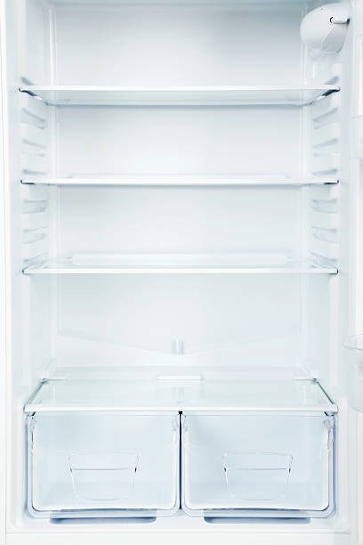 istock The open fridge with the shelves, close up 531480400