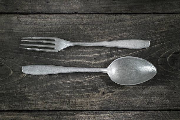 istock Old cutlery on wooden table 531480654