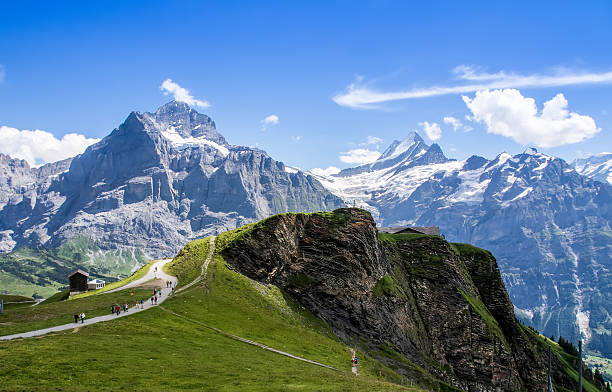 знаменитый эйгер, мёнх и юнгфрау горы в юнгфрау regio - jungfraujoch стоковые фото и изображения