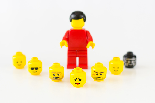 Florence, Italy - May 12, 2016: Lego minifigure heads have V-shape with female head foreground