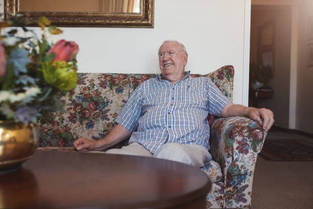istock Relaxed senior man sitting on a sofa 531483154