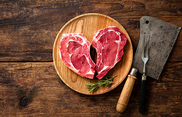 istock Heart shape raw fresh veal meat steaks 531483764