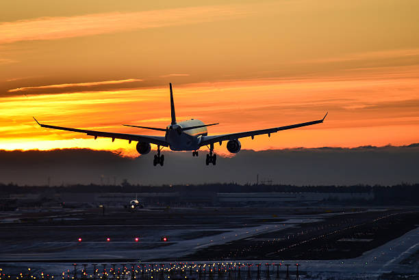istock Airplane landing late evening 531486647