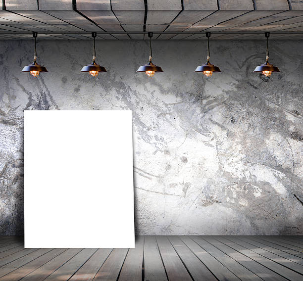 istock Poster standing on wood floor with Grungy concrete wall 531492941
