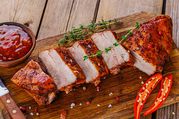 istock baked pork ribs on a wooden board 531502507