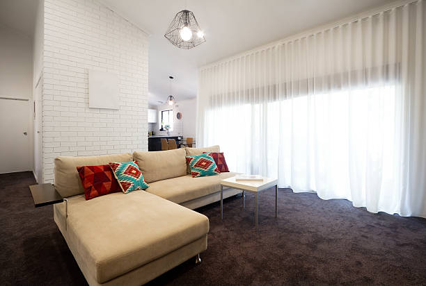 istock Contemporary living room with sheer curtains 531504929