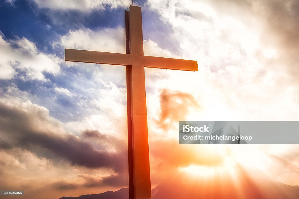 cross in the mountain at the sunset 2015 Stock Photo