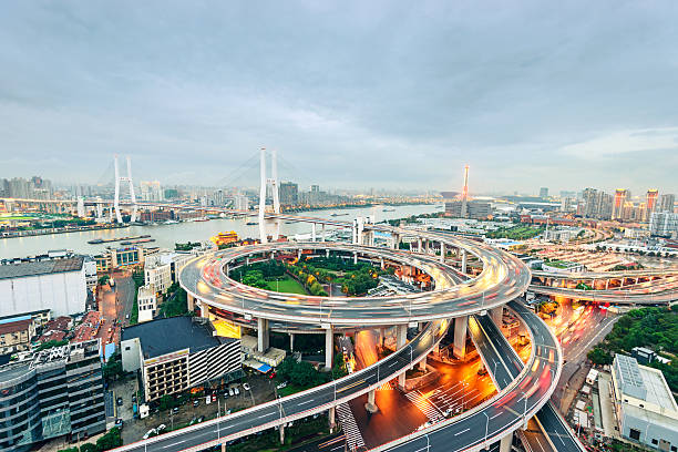 istock shanghai elevated road junction and interchange overpass at night 531505337