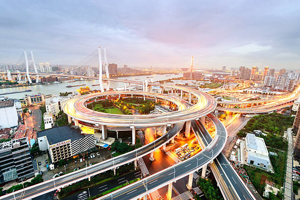 istock shanghai elevated road junction and interchange overpass at night 531505339