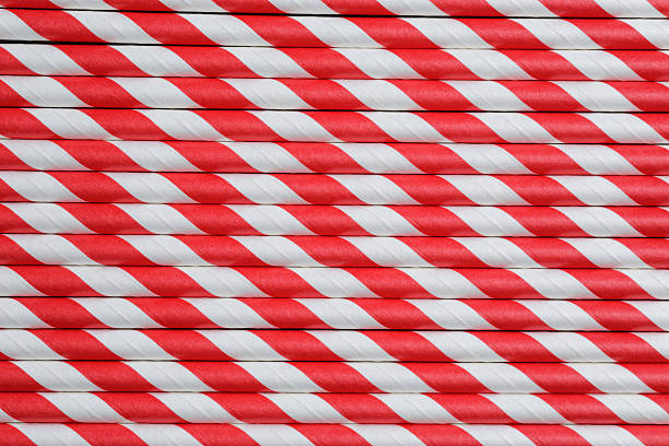 istock bright red paper straw background 531505509