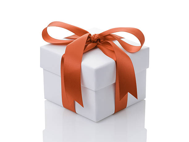 istock white gift box with orange ribbon bow 531505559
