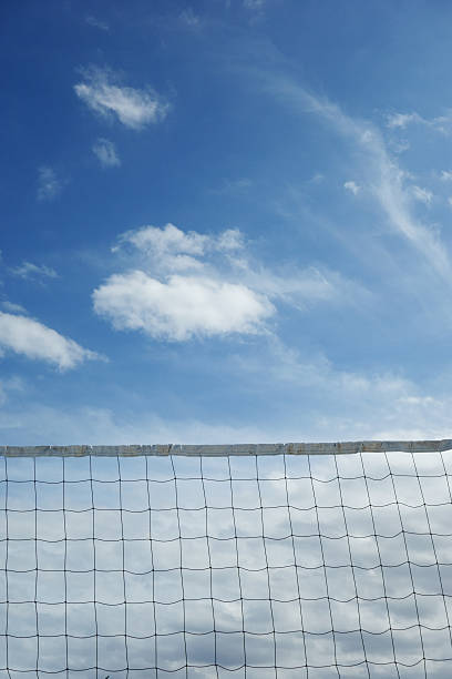 istock Volleyball net against blue sky with clouds 531506613