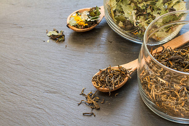 istock Black and herb tea in glass jars 531507749