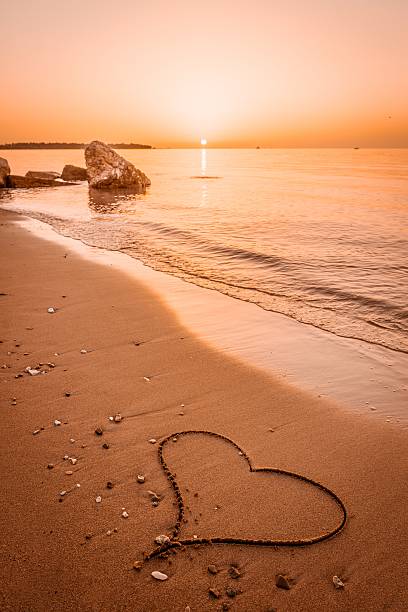istock Heart drawn on the beach sand 531516057