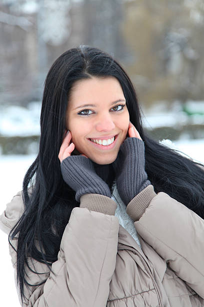 istock Smiling woman in winter 531516383