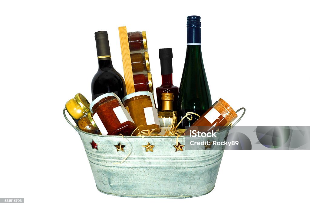 Gift basket Gift basket full of presents for several occasions. You can see some wine bottles, jam, mustard, vinegar as well as some balsamic vinegar. Gift Basket Stock Photo