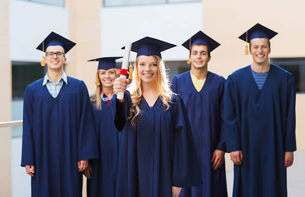 istock group of smiling students in mortarboards 531517473
