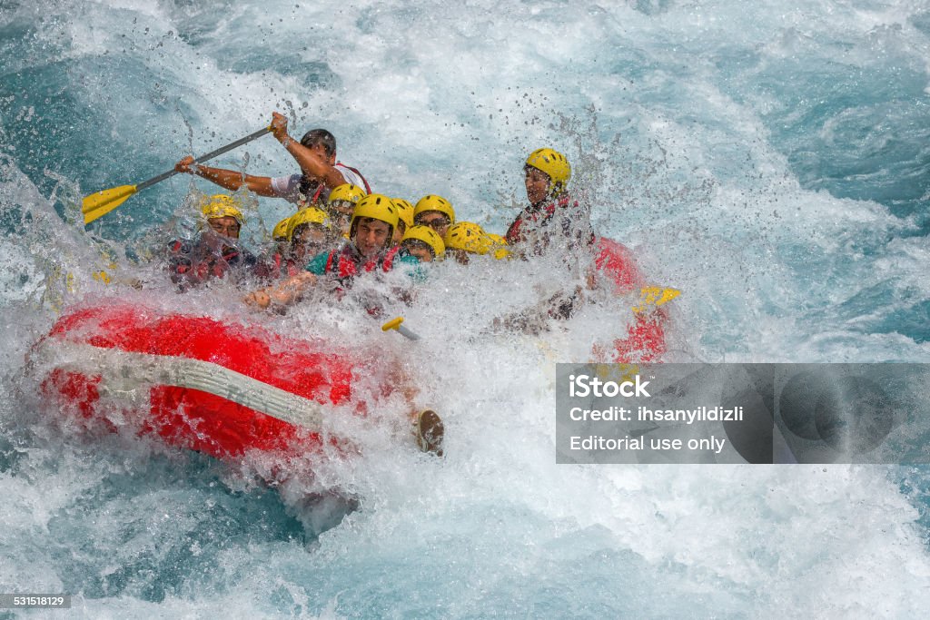 Rafting on White Water  Antalya, Turkey - August 07, 2011: A group of people rafting on Koprucay River that is one of the most popular place for rafting in Turkey.Koprucay River runs to the Mediterranean Sea through straight canyons of Tourus Mountains. 2015 Stock Photo