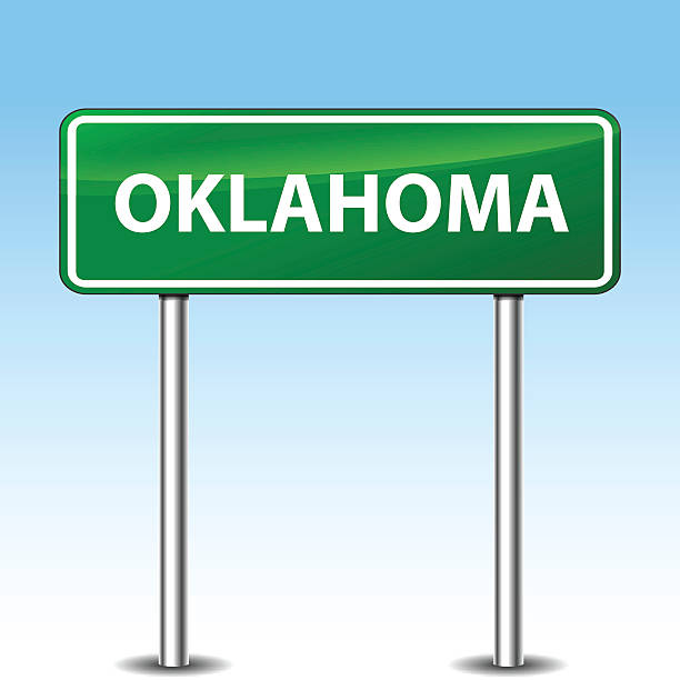 oklahoma grünen schild - oklahoma sign road sign sky stock-grafiken, -clipart, -cartoons und -symbole