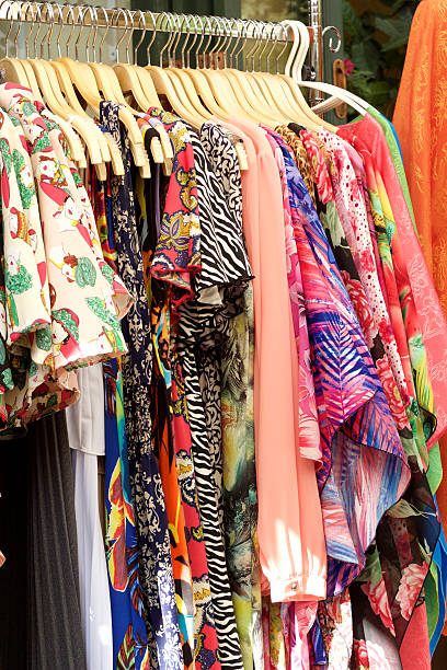 istock Clothes hung on a rack for sale. 531520341