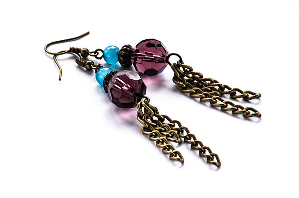 istock Hand made earrings isolated on white background 531520405
