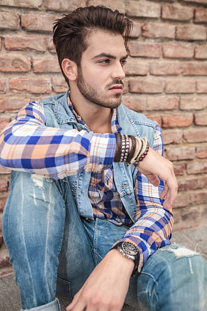 istock man resting one hand on the knee 531521081