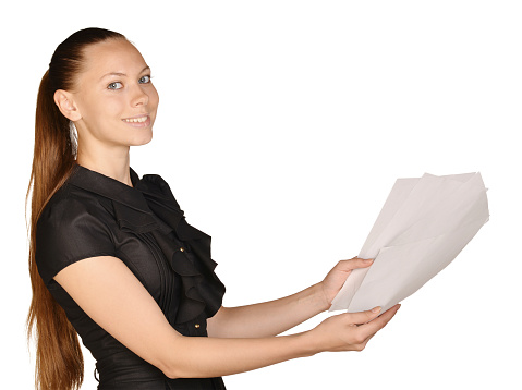 Business beautiful girl holding a blank sheet of paper