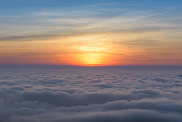 istock beautiful sunset sky with fog 531531123