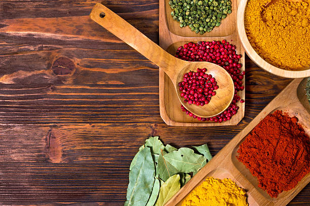 istock Colorful herbs,spices and aromatic ingredients  on wooden table. 531531379