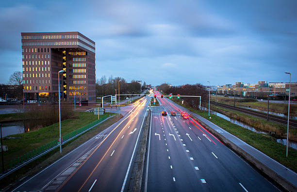 Movimentos de luz em Estrada - fotografia de stock