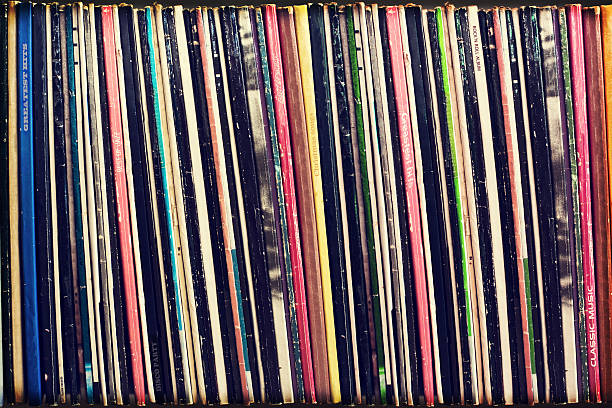 istock Collection of vinyl records covers (dummy titles) background, vintage process 531535891