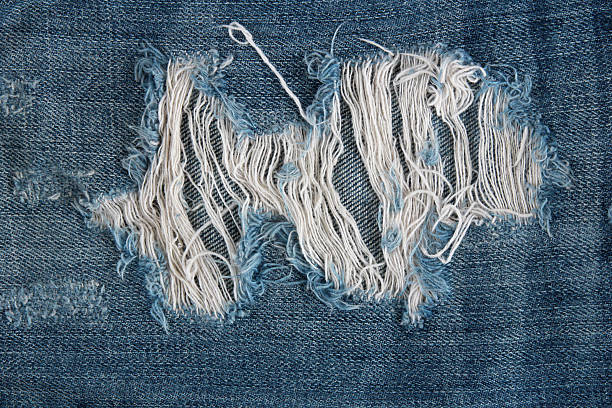 istock Striped textured blue used jeans denim linen vintage background 531536235