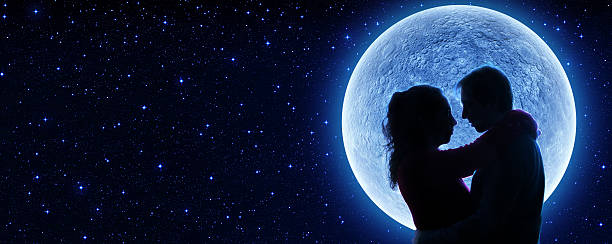istock lovers and super moon in the starry nignt - valentines 531536315