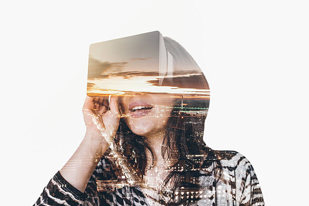 istock Double exposure of woman wearing virtual reality simulator 531536838
