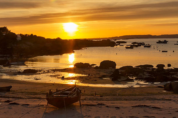 istock Dorna boat beached at sunset 531537724