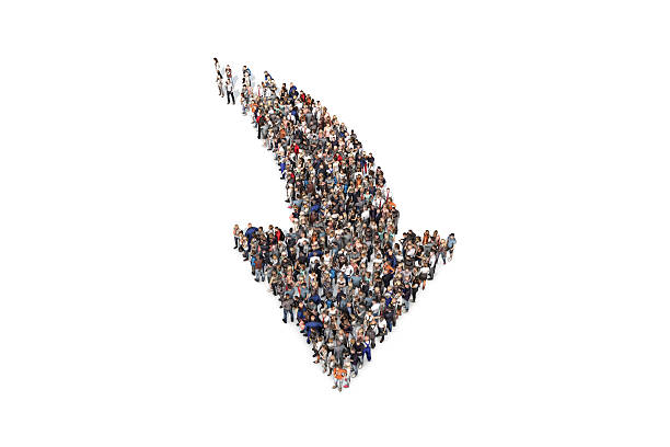 istock Group of people forming a directional arrow sign 531540666