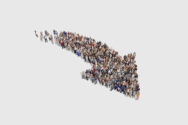 istock Group of people forming a directional arrow sign 531540746