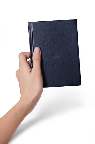 istock Hand with book isoalte ,with background with clipping path 531541018
