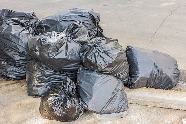 istock Plastic trash bags on outside street office 531546402