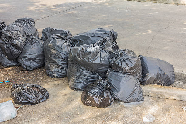 istock Plastic trash bags on outside street office 531546690