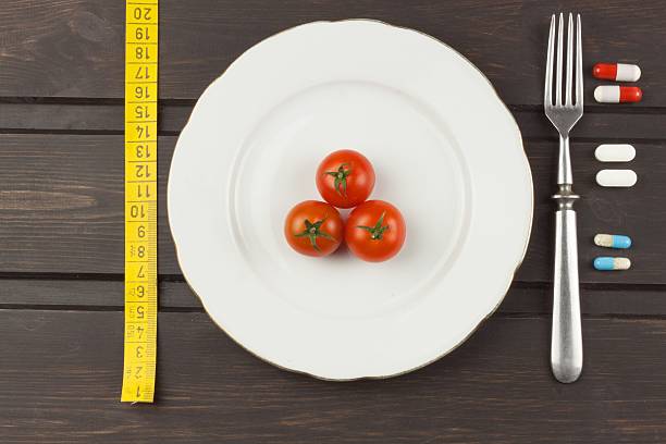 istock Diet and supplements on a wooden table 531546848